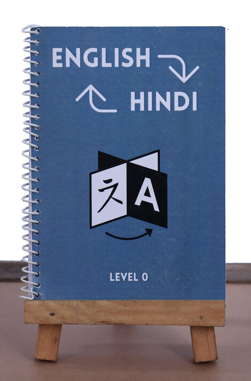 Blue notebook with English to Hindi translation symbols on a wooden stand